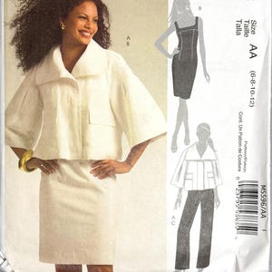 May include: McCall's M5596 sewing pattern featuring a woman in a white jacket and skirt, and illustrations of a dress and pantsuit. The pattern includes sizes AA (6-8-10-12).