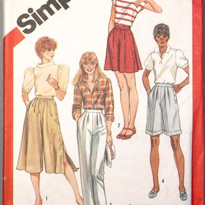 May include: Simplicity sewing pattern number 5992 for sizes 8, 10, and 12. The pattern includes four different styles: a pair of culottes, a pair of pants, a skirt, and a pair of shorts. The pattern is for misses and has a waist measurement of 24-25-26 1/2 inches.