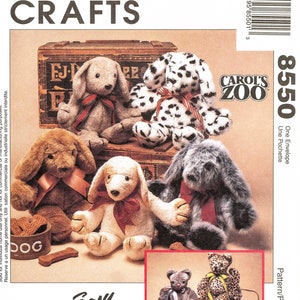 May include: A sewing pattern for making stuffed animal toys. The pattern includes instructions for making a dalmatian, a brown and white dog, a white dog with brown spots, a gray dog with white fur, and a leopard. The pattern is called "Carol's Zoo" and is from McCall's Crafts.