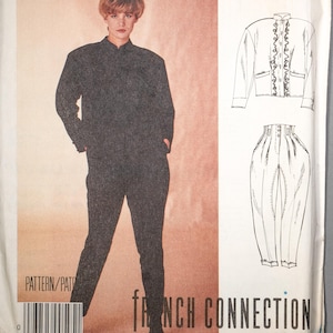 May include: A vintage McCall's sewing pattern featuring a woman in a black outfit. The pattern includes a jacket and pants design, with the words "French Connection" prominently displayed. The pattern number is 3338, size 10.