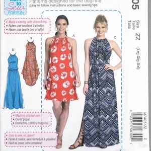 May include: McCall's sewing pattern M7405 for dresses. The pattern features illustrations of various dress styles, including a red tie-dye halter dress, a paisley print dress, a blue geometric print maxi dress, and a blue halter dress. The pattern is designed for beginners.