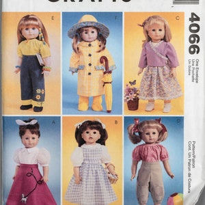 May include: A McCall's Crafts sewing pattern envelope featuring six dolls in various outfits. The envelope has the number 4066 and the text "One Envelope, Une Pochette, Un Sobre". The dolls are wearing dresses, pants, and coats.
