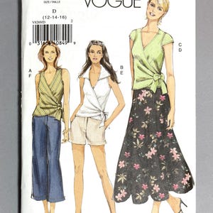 May include: Vogue pattern V8269 featuring illustrations of three women in wrap tops, shorts, and a floral skirt. The pattern includes sizes 12-14-16. The Vogue logo is at the top of the pattern.