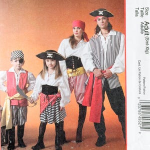 May include: A McCall's Costumes sewing pattern envelope, model M4952, featuring illustrations of four individuals in pirate-themed outfits. The costumes include white shirts, striped pants, black vests, red sashes, and pirate hats with skull and crossbones.