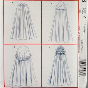 May include: A McCall's Costumes sewing pattern envelope, model M4698, size Z (Lrg-Xlg). The white envelope features a yellow header and four illustrations of capes, including variations with collars, hoods, and ruffled caplet overlays in blue ink.