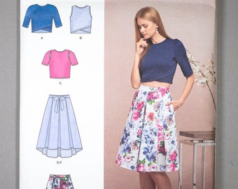 S8609 | szs 12-20 | Simplicity 8609 Pleated Skirt & Cropped Knit Tops: Knee Length or High Low Hem, Faux Wrap, Keyhole Openings, Sleeveless