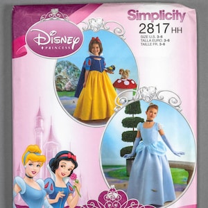 May include: Simplicity sewing pattern featuring Disney Princess costumes. The package includes illustrations of Cinderella and Snow White, and images of children wearing the costumes. The pattern number is 2817 HH, with sizes U.S. 3-6.