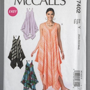 May include: McCall's sewing pattern M7402 featuring a woman wearing a sleeveless, orange patterned dress. The pattern includes illustrations of other dress designs in various colors and patterns. The word "EASY" is in a pink circle.