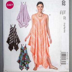 May include: A McCall's sewing pattern, M7402, featuring a woman modeling a sleeveless, flowing dress with a geometric pattern. The pattern includes illustrations of similar dress designs. The word "EASY" is printed on the front.