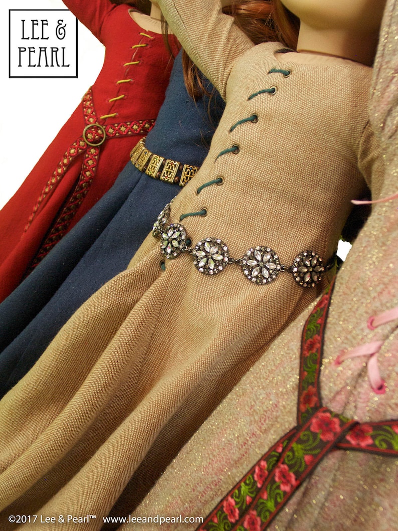 Lee & Pearl Pattern 3001: Late Medieval Lady's Wardrobe for 18 inch dolls such as American Girl — historical doll kirtle (dress), mantle (cloak), shift and girdle (belt). Illustrated historical background information booklet is included.