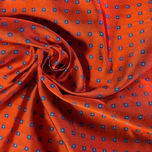 100% Silk Jacquard Fabric — Persimmon Orange Repp Twill with Purple Green Gold Floral Foulard, 28" Wide — Sold by HALF YARD — Grid Pattern