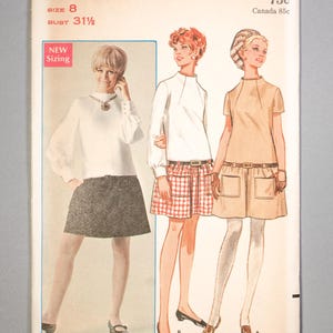 May include: Vintage Butterick sewing pattern featuring illustrations of three women in 1960s dresses. The pattern includes sizes for Junior and Misses. The cover has the text "BUTTERICK" and "5190".
