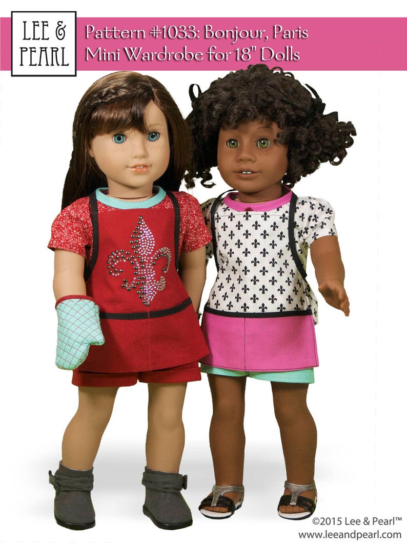 May include: Two 18-inch dolls wearing different outfits. The doll on the left is wearing a red and black outfit with a blue and white oven mitt. The doll on the right is wearing a white and black patterned shirt with a pink and blue skirt.