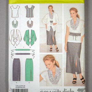 May include: Sewing pattern Simplicity 1920 AA for sizes US 10-18, Euro 36-44, and French 38-46. The pattern includes instructions for making a top, a jacket, and a skirt with a slit. The pattern is from the publisher of Threads, SewStylish.