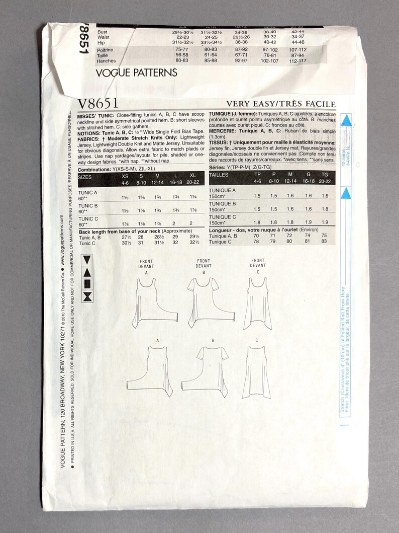 May include: Vogue Patterns sewing pattern V8651 for misses' tunics. The pattern includes instructions for close-fitting tunics with scoop necklines and asymmetrical hems. Fabric suggestions and size charts are also included.