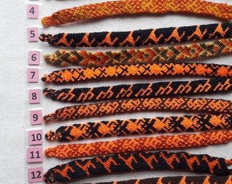 Bracelets d'amitié andins oranges noirs