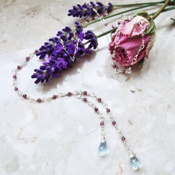 Garnet necklace with blue topaz