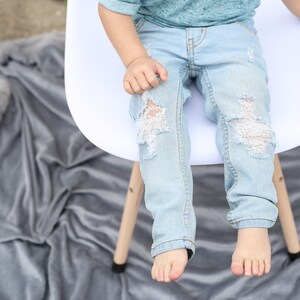 baby blue ripped jeans
