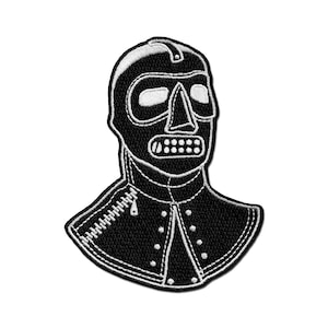 May include: Black and white embroidered patch of a person wearing a black leather mask with a skull design. The mask has a zipper on the neck.