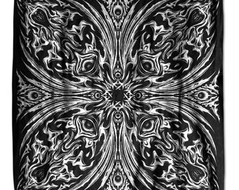 May include: Black and white bandana with a symmetrical, abstract design. The pattern features swirling lines, eye-like shapes, and a central starburst. The overall aesthetic is gothic and intricate, suitable for various styles.