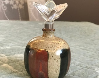 Vintage pottery perfume bottle