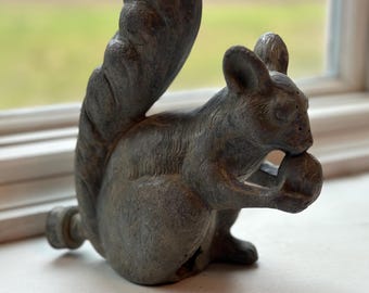 Aspersor de ardillas de hierro fundido