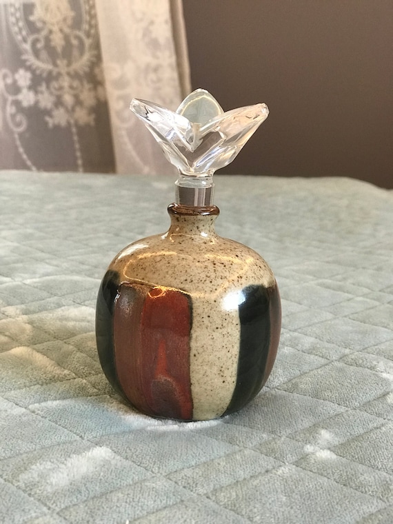 Vintage pottery perfume bottle