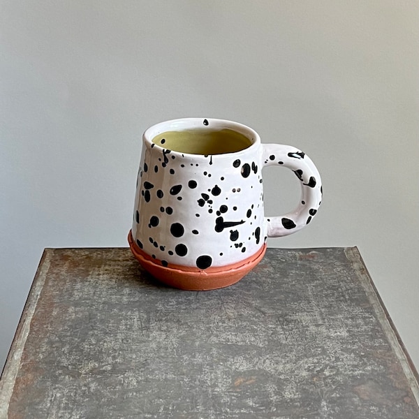 black speckle mug with green interior, handmade pottery with coil handle