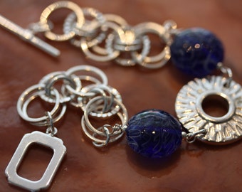 Bracelet en verre Rhodium et art unique avec disque focal étincelant