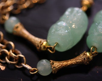 Elegant vintage carved glass necklace and earring set