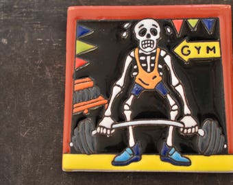 Mosaico mexicano de azulejos de Talavera-Día de los muertos  / Catrín en el gmy