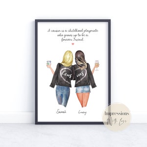 May include: A framed illustration of two women wearing black jackets with the words "Cous" and "ins" on the back. The women are holding a coffee cup and a glass of wine. The text below the image reads "A cousin is a childhood playmate who grows up to be a forever friend." The names "Sarah" and "Lucy" are written below the women. The bottom right corner of the image has the text "Impressions With Love."