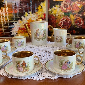 Amethyst tea set - exquisite carving of a tea kettle and 4 tea cups in