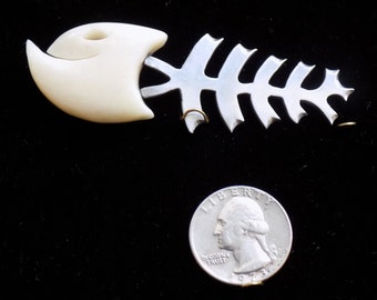 Handmade one of a kind Bone and stainless steel fish pendant