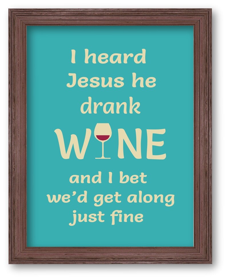 May include: A framed turquoise blue poster with a white background and the text "I heard Jesus he drank WINE" with a red wine glass icon. The text "and I bet we'd get along just fine" is below the wine glass icon.