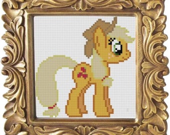 Peut inclure: Un motif de point de croix représentant un poney jaune et blanc avec une crinière et une queue brunes. Le poney a une pomme rouge sur son flanc et se tient sur un fond blanc.