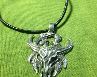 Pewter Western style Longhorn Skull, with feathers, pendant, necklace on a black leather cord.