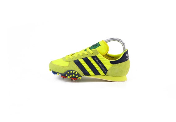 neon yellow track spikes