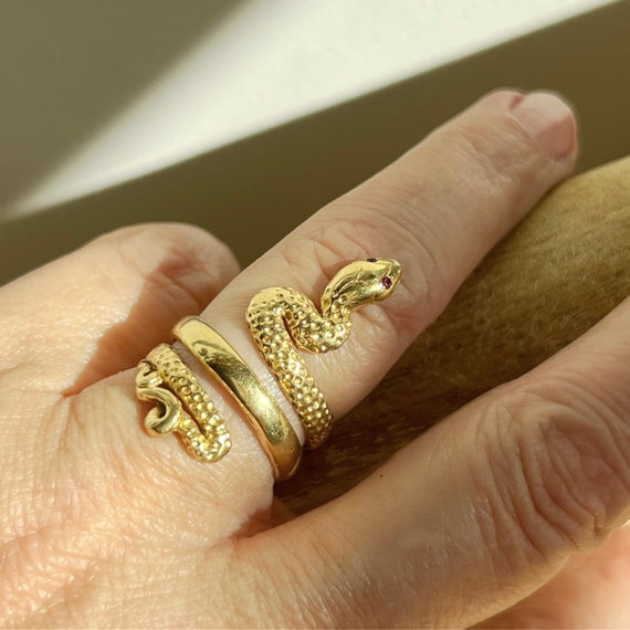 Gold snake ring with ruby eyes meaning sale