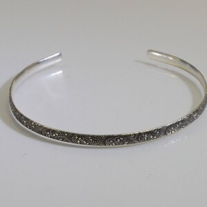 Sterling Silver Cuff Bracelet With a Tiny Floral Pattern