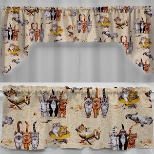 May include: A beige valance with a repeating pattern of cats wearing hats and sunglasses. The cats are in various poses, including lounging on beach chairs and sitting upright. The valance is made of a soft, lightweight fabric.