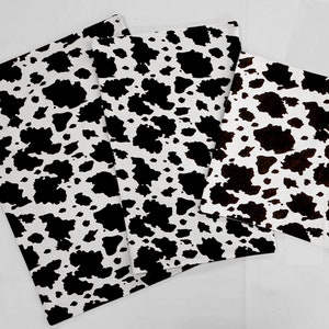Black & White Cow Spots Countertop Protecting Slider Mats