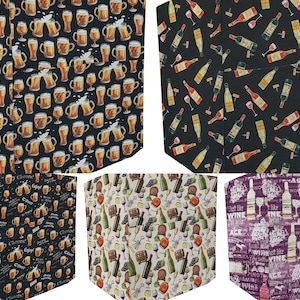 May include: Six different fabric swatches with various patterns related to beer and wine. The patterns include beer mugs, wine bottles, grapes, and wine glasses. The fabrics are in various colors, including black, white, purple, and beige.