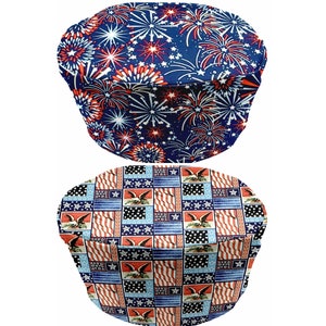 May include: Two round table covers with a patriotic theme. The first cover features a blue background with red and white fireworks. The second cover features a patchwork design of red, white, and blue stars and stripes.