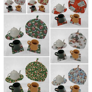 May include: Set of 10 Christmas themed tea cozy covers and matching teacup and teapot coasters. The covers feature various Christmas designs including Santa Claus, reindeer, snowmen, and Christmas trees. The coasters are in green, orange, and red.