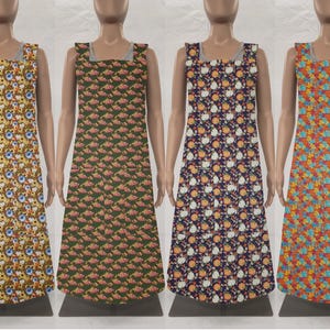 May include: Four sleeveless aprons with different floral patterns. The aprons are made of a lightweight fabric and have a simple design. The patterns include yellow and blue flowers, green and pink flowers, white and orange flowers, and red and blue flowers.