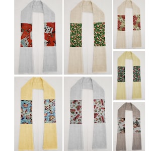 May include: Ten different Christmas themed stoles, each with a different pattern. The stoles are made of a soft, white fabric and are perfect for adding a festive touch to any outfit.