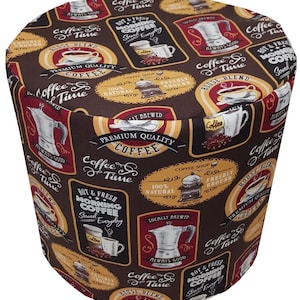 May include: A brown fabric coffee themed cylindrical container with a repeating pattern of coffee mugs, coffee beans, coffee pots, and text that says "Coffee & Time", "Hot & Fresh Morning Coffee", "Premium Quality Coffee", "House Blend", "Locally Brewed", "Always Good", "100% Natural", "Freshly Ground", and "Coffee Shop".
