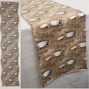 May include: A beige table runner with a repeating pattern of coffee cups and the word "Coffee" in brown and black lettering. The runner has a wavy edge.