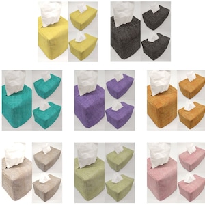 May include: Set of 10 tissue box covers in various colors, including yellow, teal, purple, orange, beige, and pink. Each cover features a textured fabric design and a square shape.